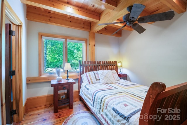 54 Cottage Grove Dr, Nebo, NC 28761 - bedroom featuring wood ceiling, ceiling fan, hardwood / wood-style flooring, and beam ceiling