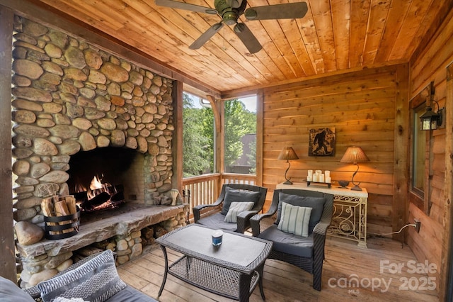 54 Cottage Grove Dr, Nebo, NC 28761 - sunroom featuring ceiling fan and a fireplace