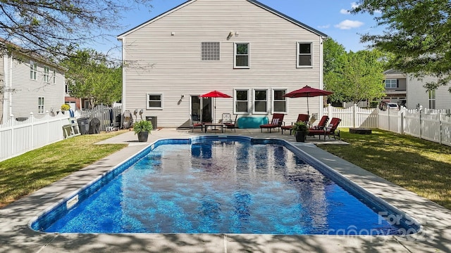 221 Sycamore Creek Rd, Fort Mill, SC 29708 - back of house with a lawn, a fenced backyard, a fenced in pool, and a patio area