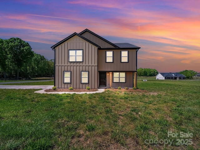 3012 Isle Ln, Monroe, NC 28110 - modern farmhouse style home with board and batten siding and a front lawn