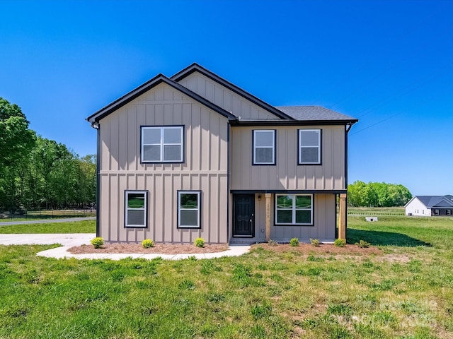 3012 Isle Ln, Monroe, NC 28110 - modern farmhouse style home with board and batten siding and a front yard