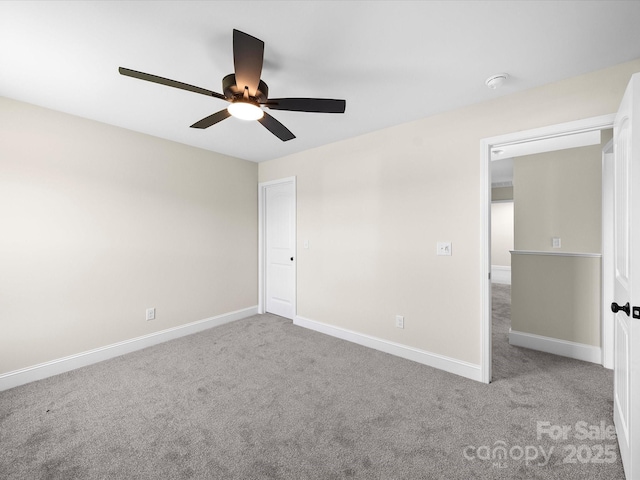 3012 Isle Ln, Monroe, NC 28110 - unfurnished bedroom with ceiling fan, baseboards, and carpet