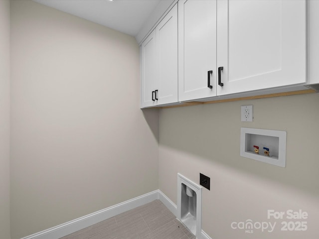 3012 Isle Ln, Monroe, NC 28110 - clothes washing area featuring hookup for an electric dryer, baseboards, cabinet space, and hookup for a washing machine