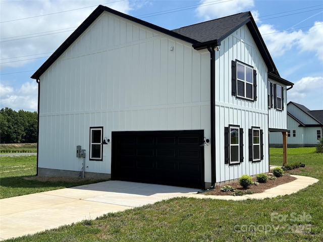 3012 Isle Ln, Monroe, NC 28110 - view of property exterior featuring a yard, concrete driveway, roof with shingles, and board and batten siding
