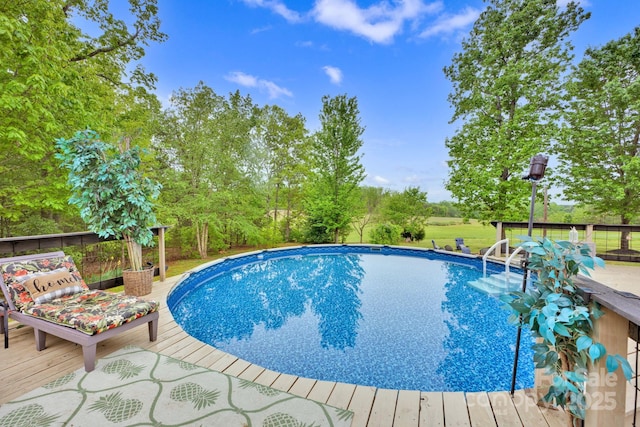 pool with a wooden deck