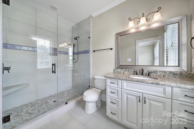 full bathroom with a shower stall, toilet, vanity, and ornamental molding