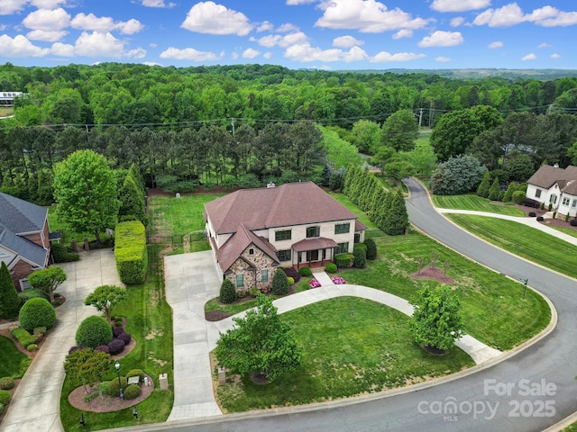 bird's eye view featuring a view of trees