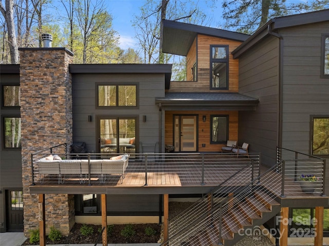 146 Timber Creek Rd, Hendersonville, NC 28739 - back of property featuring stone siding and stairway