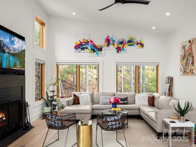 146 Timber Creek Rd, Hendersonville, NC 28739 - living area featuring recessed lighting, a high ceiling, a fireplace with flush hearth, light wood-style floors, and ceiling fan
