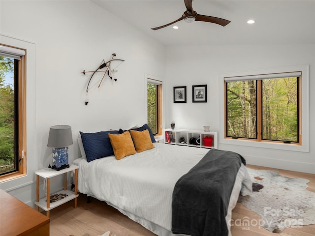 146 Timber Creek Rd, Hendersonville, NC 28739 - bedroom featuring a ceiling fan, recessed lighting, wood finished floors, and lofted ceiling