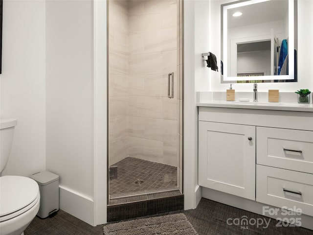 146 Timber Creek Rd, Hendersonville, NC 28739 - bathroom with a shower stall, tile patterned floors, vanity, and toilet