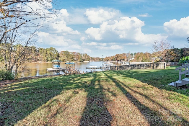 6778 Emerald Isle Dr, Sherrills Ford, NC 28673 - view of grassy yard featuring a water view and a dock