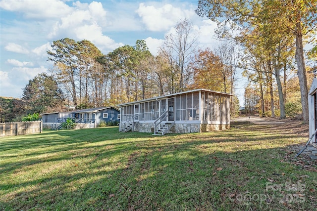 6778 Emerald Isle Dr, Sherrills Ford, NC 28673 - back of house featuring a sunroom