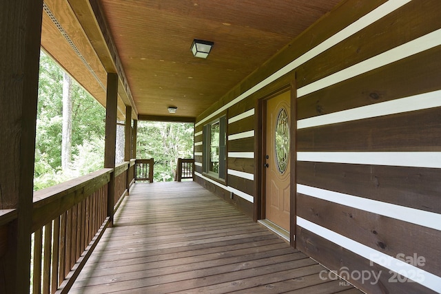 wooden terrace with covered porch
