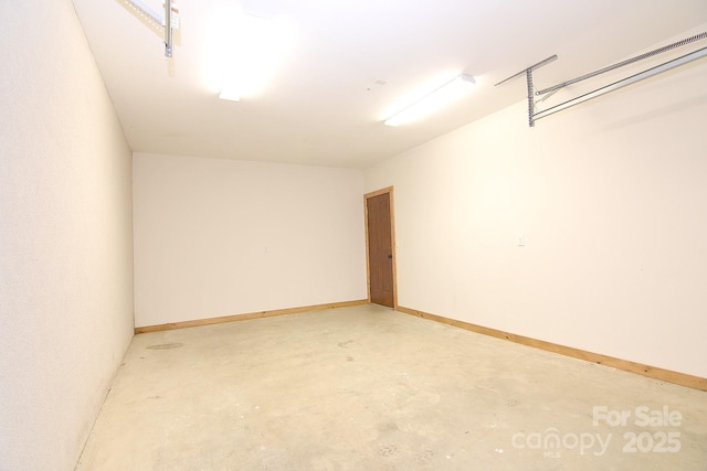 garage with baseboards