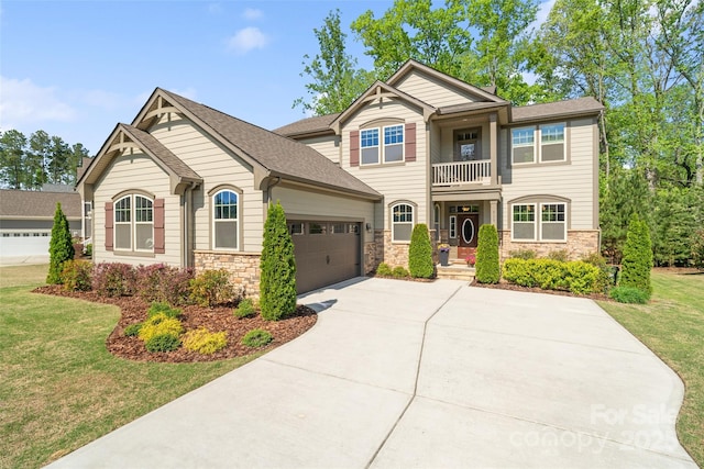 513 Sandbar Pt, Lake Wylie, SC 29710 - craftsman-style house featuring concrete driveway, a garage, a front lawn, and a balcony