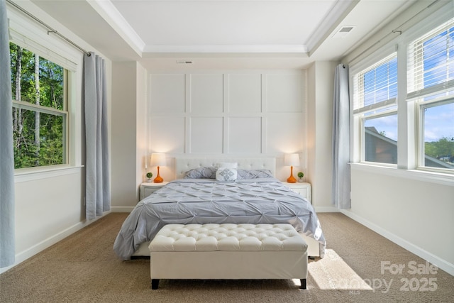 513 Sandbar Pt, Lake Wylie, SC 29710 - carpeted bedroom with crown molding, a tray ceiling, baseboards, and visible vents