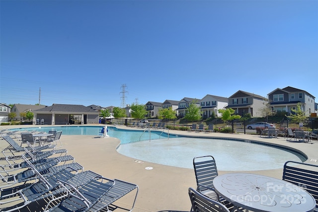 11616 Solstice Way, Huntersville, NC 28078 - community pool with fence, a patio, and a residential view
