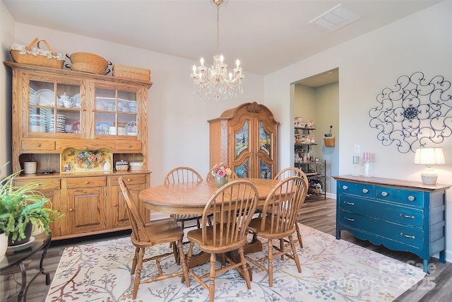 11616 Solstice Way, Huntersville, NC 28078 - dining area featuring visible vents, an inviting chandelier, and light wood-style floors