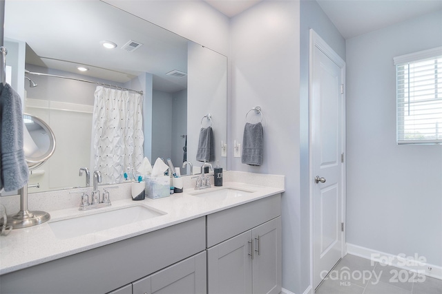 11616 Solstice Way, Huntersville, NC 28078 - full bath featuring a sink, baseboards, and visible vents