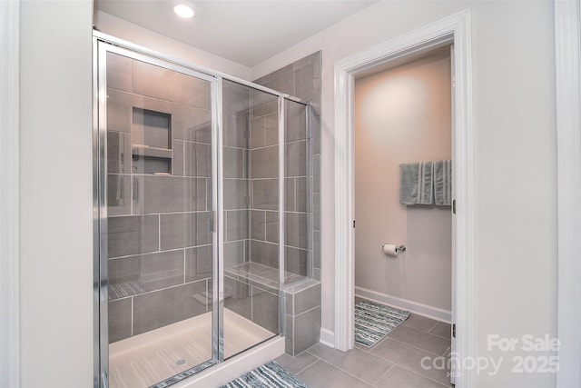 11616 Solstice Way, Huntersville, NC 28078 - bathroom with baseboards, recessed lighting, a stall shower, and tile patterned flooring