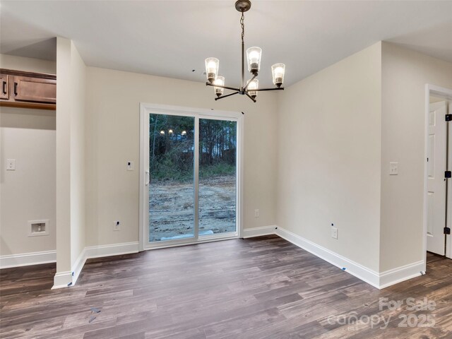 4149 River Run Cir, Hickory, NC 28602 - unfurnished dining area featuring a chandelier, dark wood-style flooring, and baseboards