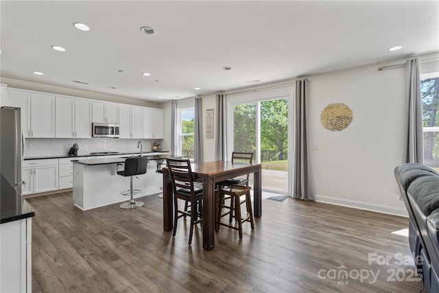 184 Tetcott St, Mooresville, NC 28115 - dining room featuring recessed lighting and dark wood-style flooring