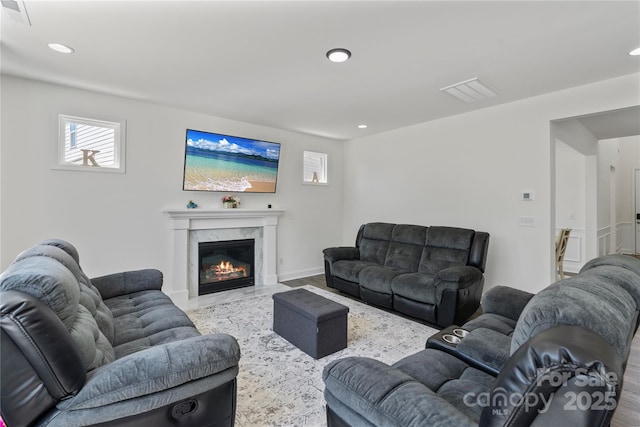 184 Tetcott St, Mooresville, NC 28115 - living room featuring baseboards, a premium fireplace, visible vents, and recessed lighting