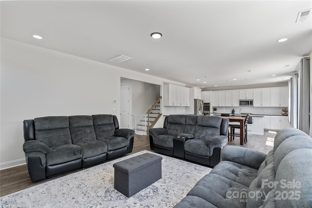 184 Tetcott St, Mooresville, NC 28115 - living room featuring recessed lighting, wood finished floors, and visible vents