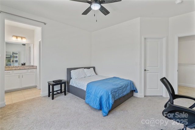 184 Tetcott St, Mooresville, NC 28115 - bedroom with connected bathroom, ceiling fan, and light carpet