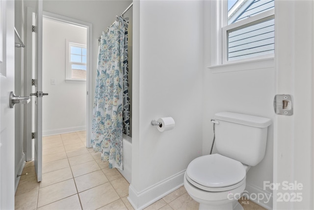 184 Tetcott St, Mooresville, NC 28115 - bathroom featuring shower / bath combination with curtain, tile patterned floors, baseboards, and toilet
