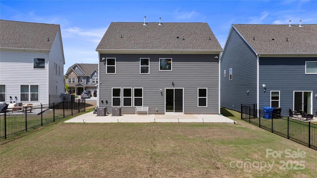 184 Tetcott St, Mooresville, NC 28115 - rear view of house featuring a fenced backyard, a patio area, and a lawn