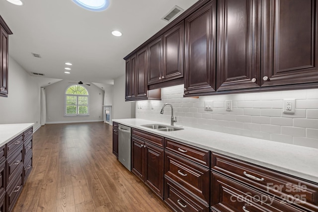 7502 Hurstbourne Green Dr, Charlotte, NC 28277 - kitchen featuring visible vents, a sink, light countertops, backsplash, and stainless steel dishwasher