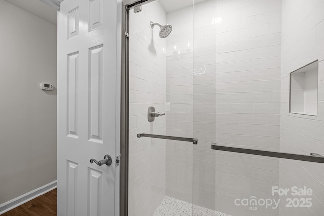 7502 Hurstbourne Green Dr, Charlotte, NC 28277 - full bath featuring a shower stall and baseboards