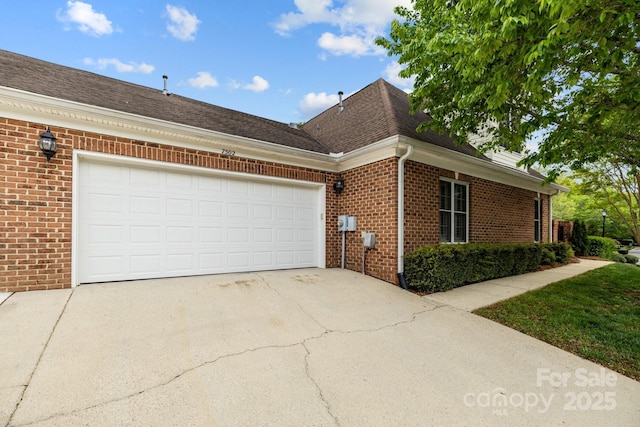 7502 Hurstbourne Green Dr, Charlotte, NC 28277 - view of side of home with a garage, brick siding, driveway, and a shingled roof