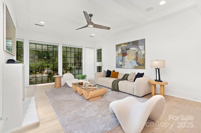 living room featuring visible vents, recessed lighting, ceiling fan, and wood finished floors