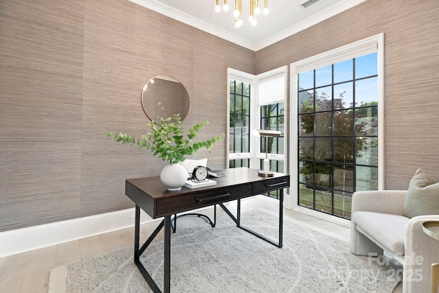 home office featuring ornamental molding, wood finished floors, and a notable chandelier
