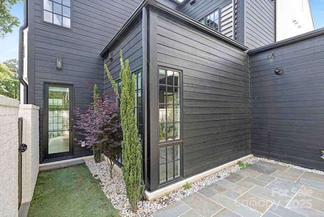 entrance to property with a patio area