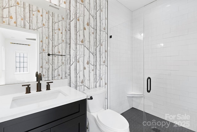full bath with vanity, visible vents, toilet, and a shower stall