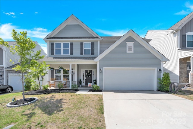 3153 Pinehills Way, Mount Holly, NC 28120 - view of front of house with an attached garage, a shingled roof, a front lawn, a porch, and driveway