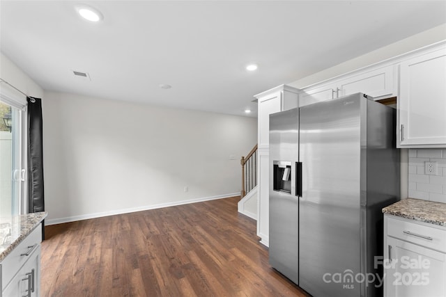 kitchen featuring white cabinets, dark wood finished floors, visible vents, recessed lighting, and stainless steel refrigerator with ice dispenser