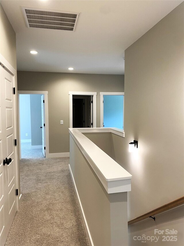 117 Blackbeard Ln, Mooresville, NC 28117 - corridor with recessed lighting, baseboards, visible vents, and light colored carpet