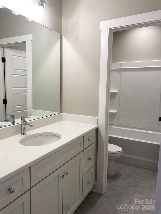 117 Blackbeard Ln, Mooresville, NC 28117 - bathroom featuring bathtub / shower combination, vanity, tile patterned flooring, and toilet