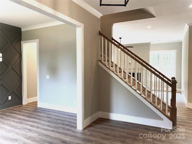 117 Blackbeard Ln, Mooresville, NC 28117 - stairway featuring wood finished floors, baseboards, and ornamental molding