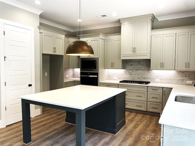 117 Blackbeard Ln, Mooresville, NC 28117 - kitchen featuring oven, gas cooktop, light countertops, stainless steel microwave, and visible vents
