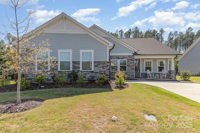 8011 Green Heron Ct, Belmont, NC 28012 - craftsman inspired home featuring a porch, a front lawn, and stone siding