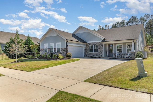 8011 Green Heron Ct, Belmont, NC 28012 - craftsman-style home featuring an attached garage, concrete driveway, and stone siding