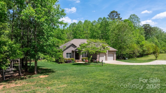 view of front of property featuring a garage, a front lawn, and concrete driveway