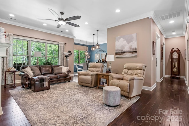 living area with baseboards, a ceiling fan, visible vents, and dark wood-type flooring