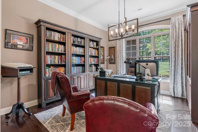 office area with a notable chandelier, visible vents, ornamental molding, baseboards, and dark wood-style flooring